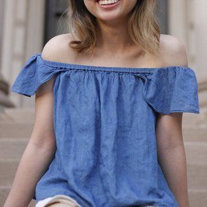 Blue off the shoulder ruffle tee